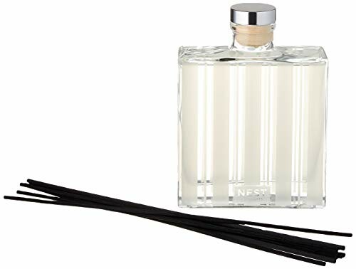 Nest reed diffuser with sticks.