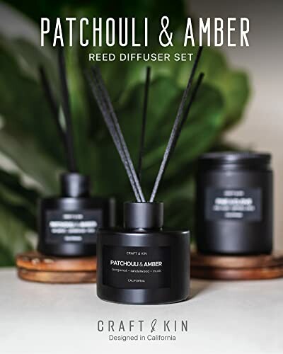 Patchouli and Amber reed diffuser set with black bottles and reeds.